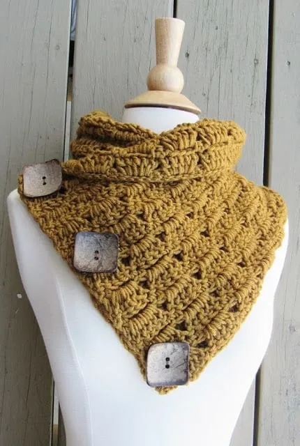 Alice button cowl with big square buttons on a mannequin