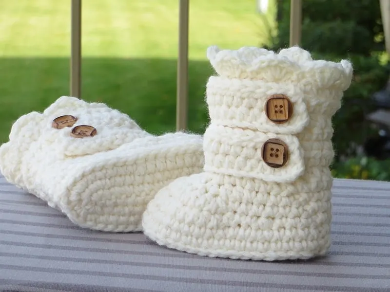 crochet toddler slipper boots in cream color with 2 straps