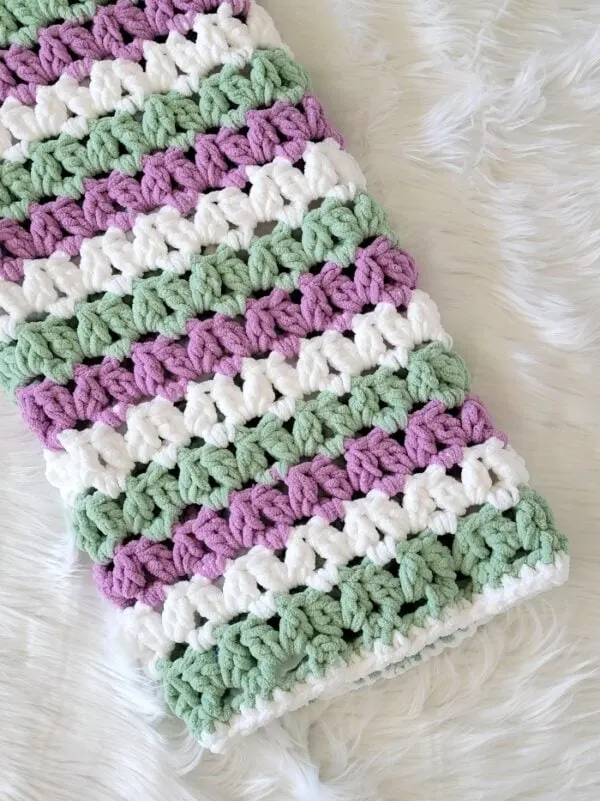 Blanket crochet pattern finished in Purple, sage and white.