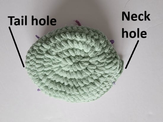 Body of crochet dinosaur in green color