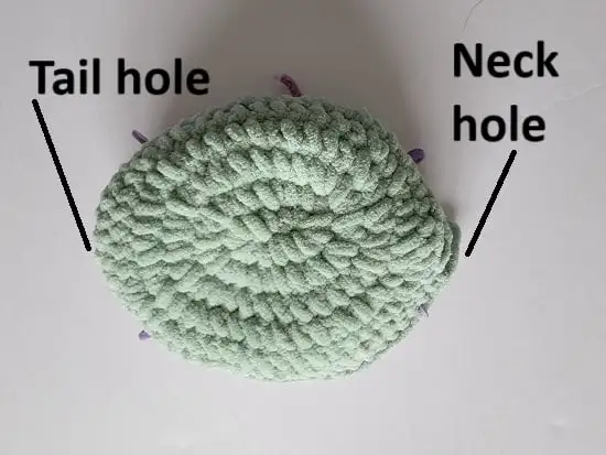 Body of crochet dinosaur in green color