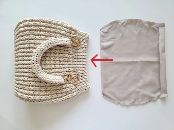 Insert the prepared lining into the bag
