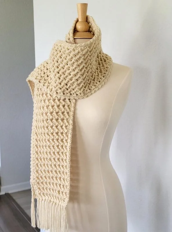 Full length view of finished crochet scarf on a mannequin