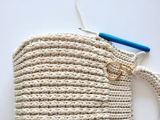 Slip stitch the side of crochet bag shut