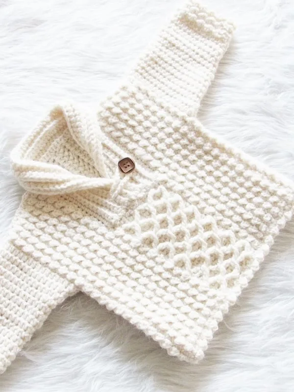Cream color crochet baby sweater