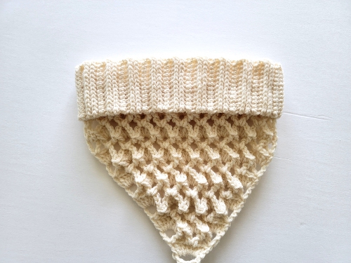 Collar slipped over the triangle part of cowl