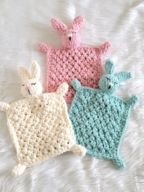 Crochet bunny lovey in pink, blue and cream colors