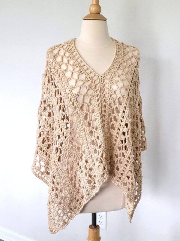 Crochet summer poncho in cream color