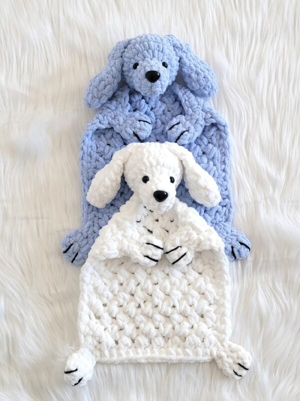 Blue and white crochet dog lovey place one on top of the other