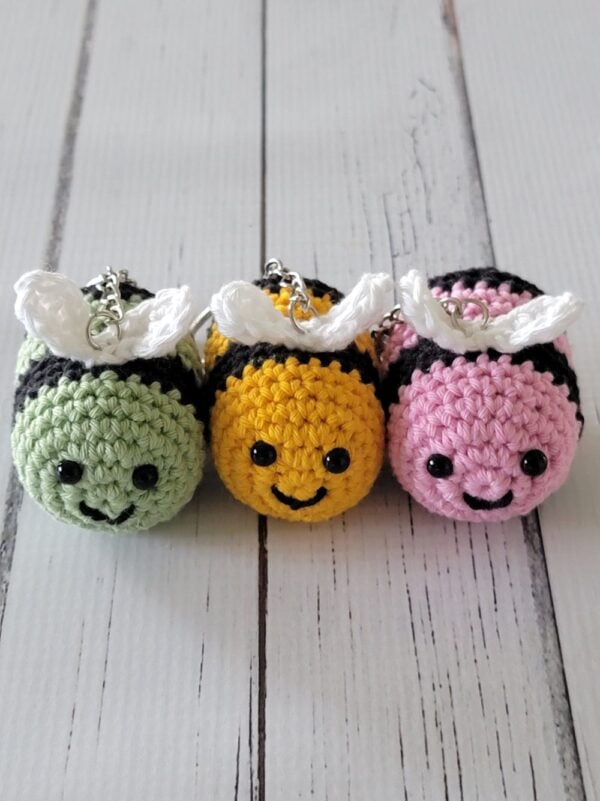 Three crochet keychains placed side by side