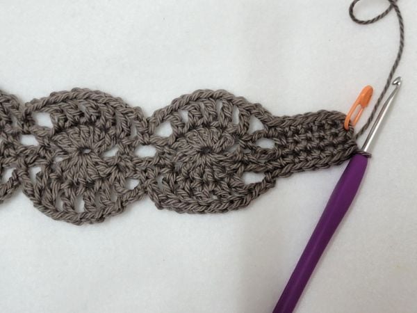 Round 2 of headband finished in brown color