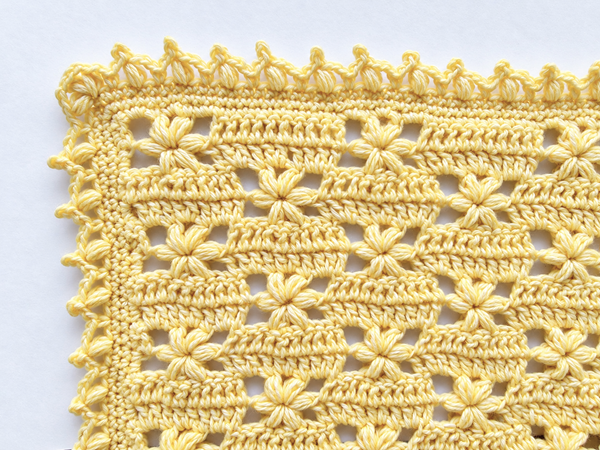 Closeup of flower baby blanket border