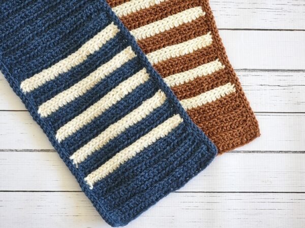 Closeup of brown and navy striped scarves showing the edging